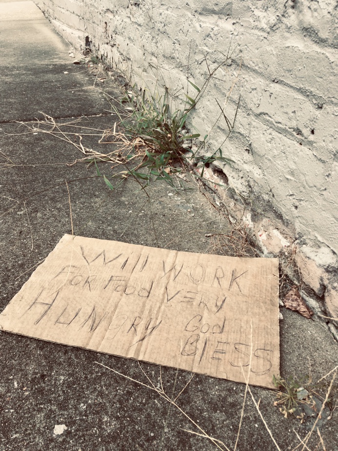 panhandling sign