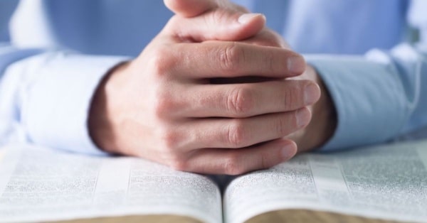 Bible hands feature