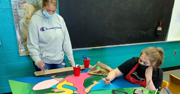 students in school wearing masks