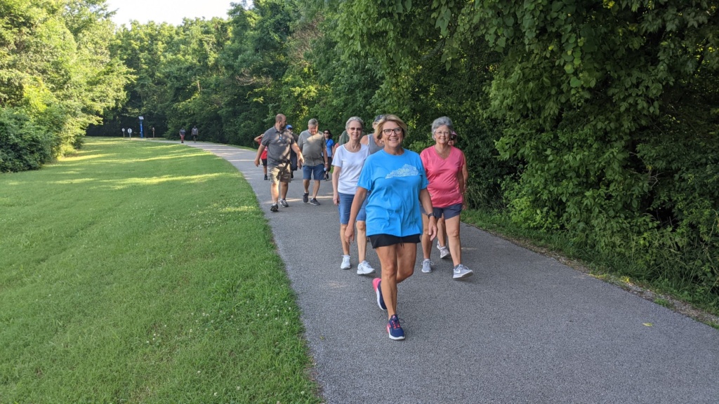 library walking group members on rail trail