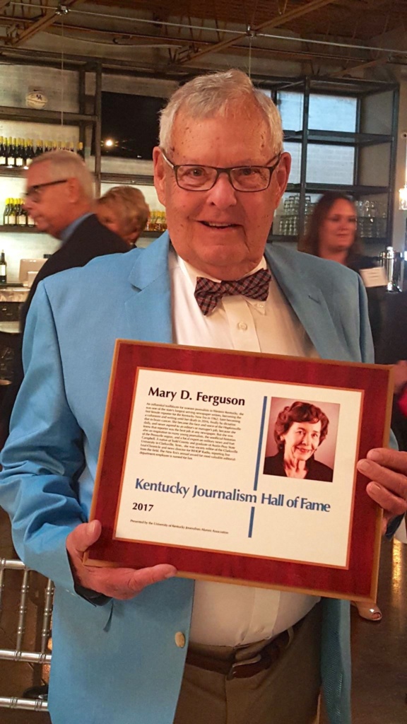 RN Ferguson holding Mary D Ferguson plaque