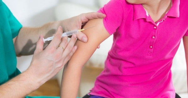 child getting vaccine