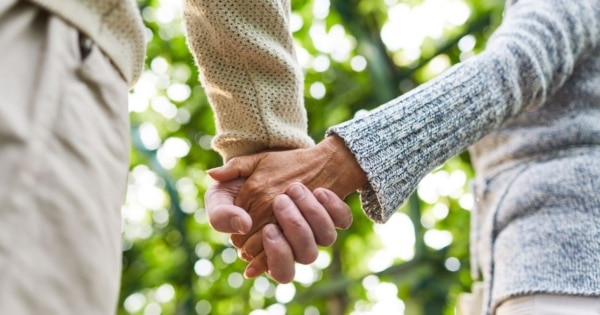 seniors holding hands feature