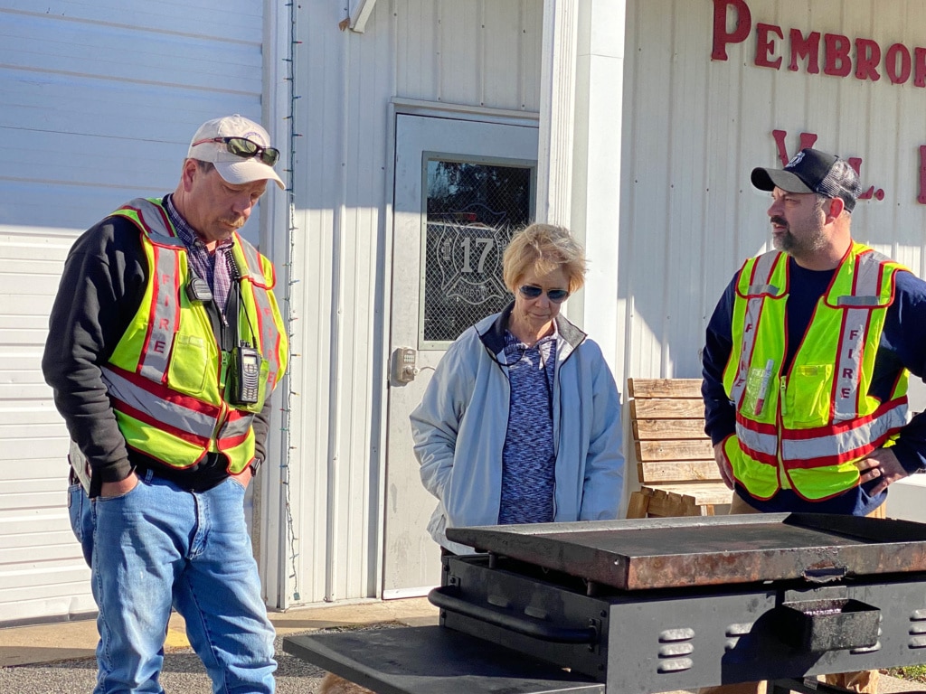 people next to a grill at pembroke fire department