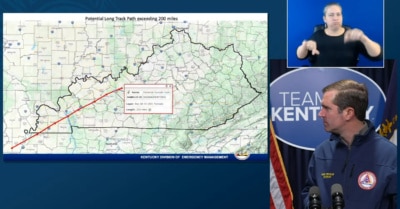 During an early morning press briefing on Saturday, Dec. 11, Gov. Andy Beshear shows a diagram of what is believed to be the path of one tornado that hit Western Kentucky early Saturday morning. The tornado was believed to have stayed on the ground for 200 miles. (Youtube screenshot)