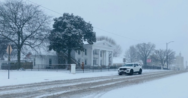 snow-jan-2022-car-on-main_feature