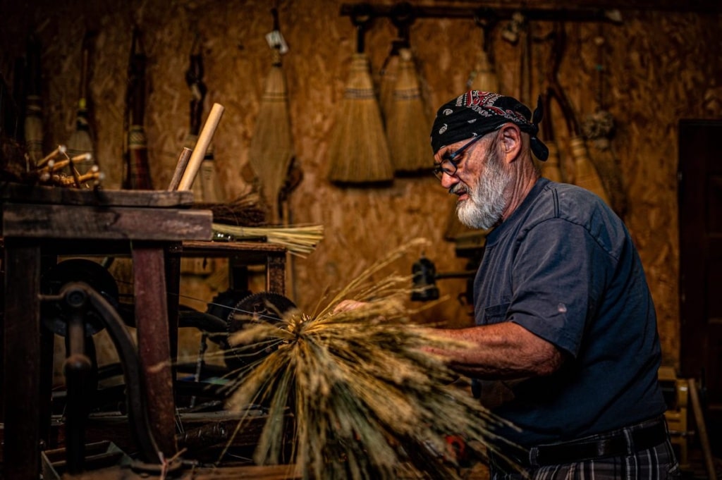 man making broom