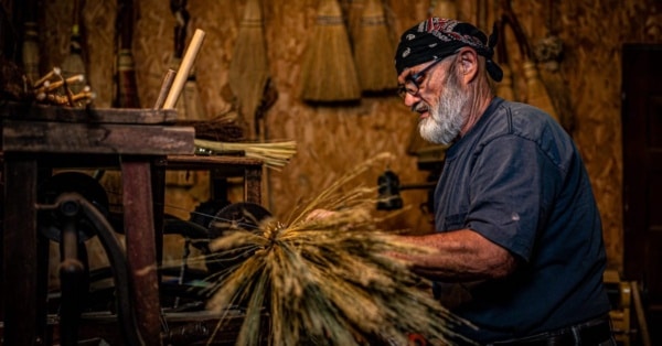 man making broom