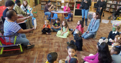 Former Imagination Library coordinator Bonnie Lynch reads to a group of children. (Hopkinsville-Christian County Public Library | File photo)