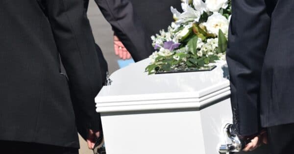 casket being carried during funeral