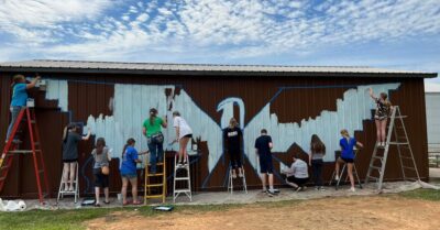 Pennyroyal Arts Council campers begin work on a mural at the Trail of Tears Commemorative Park in June 2022. (Photo by Jennifer Bowman)