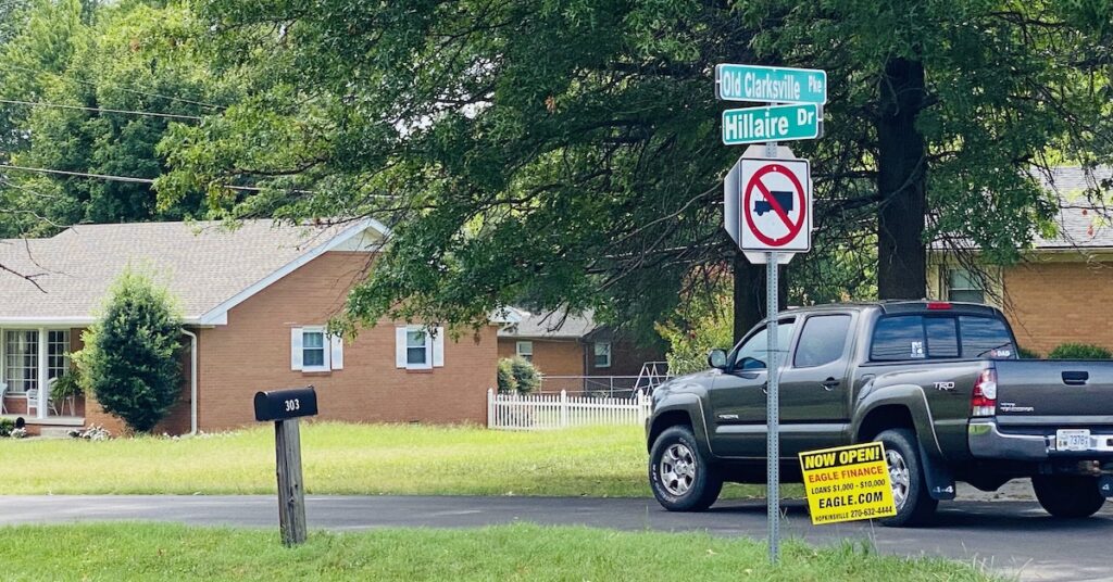 A truck turns into the Givens Addition subdivision from Old Clarksville Pike. The neighborhood developed mainly in the 1960s and '70s sits behind the commercial strip on Fort Campbell Boulevard. (Photo by Jennifer P. Brown)