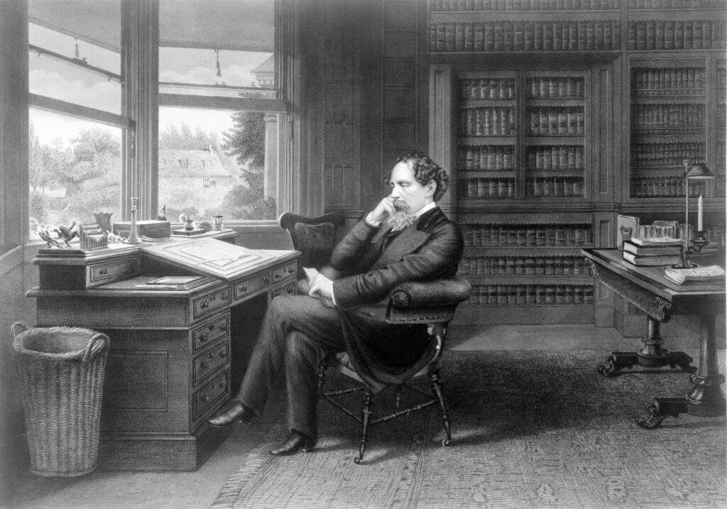 Charles Dickens at desk