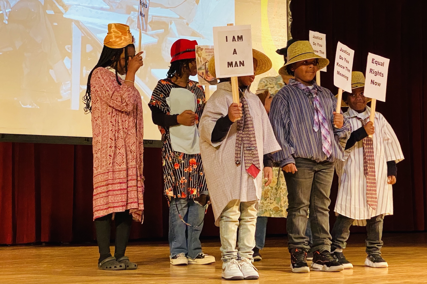 Students portray civil rights protestors from the 1960s during a program, entitled "Don't Forget to Remember," written and directed by Paulette Nance Robinson for the Martin Luther King Jr. Day program Monday at Hopkinsville Community College. (Hoptown Chronicle photo by Jennifer P. Brown)