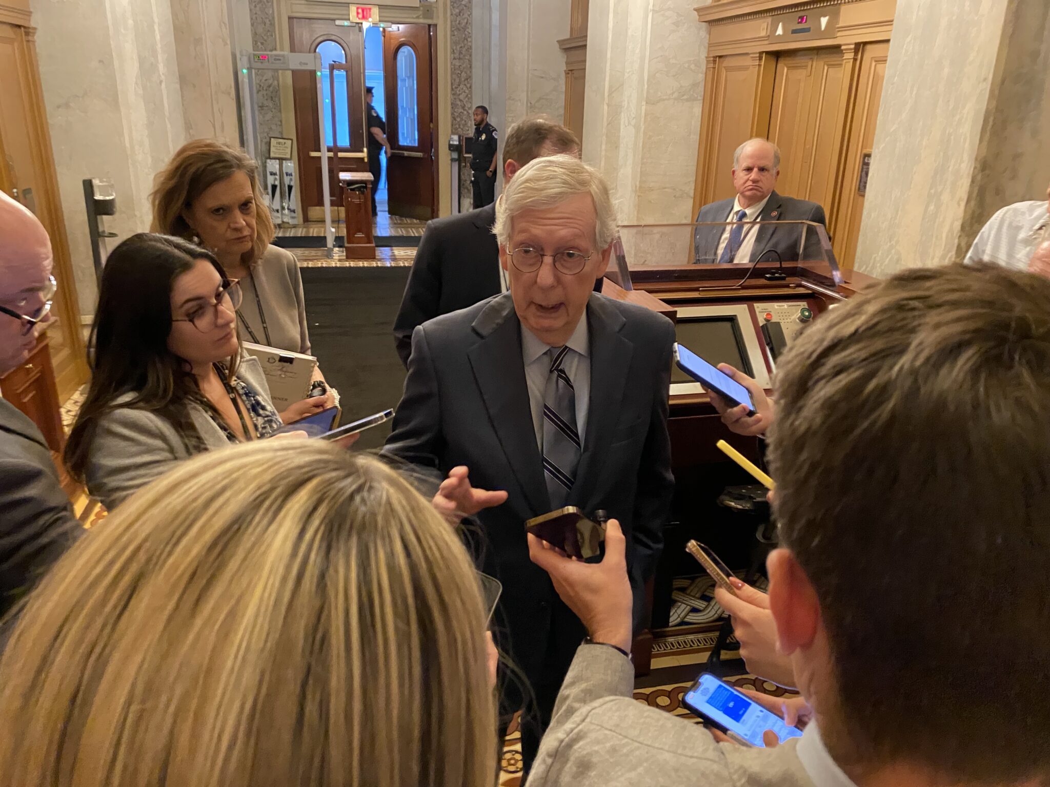 Mitch McConnell talking to reporters