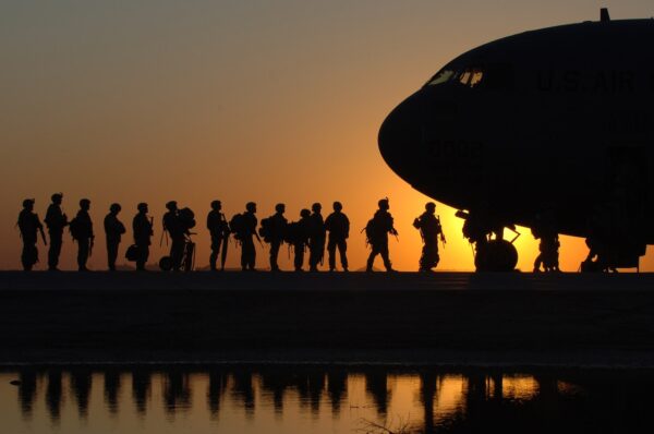 veterans walking to plane