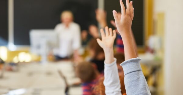 child raising hand feature