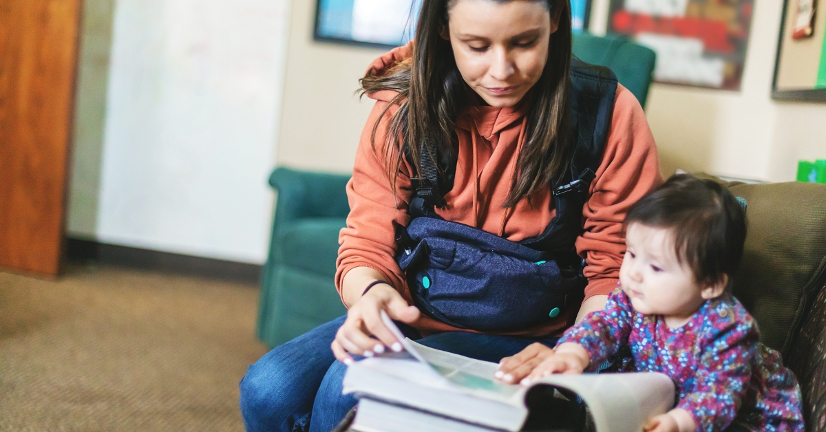 mother studying with baby