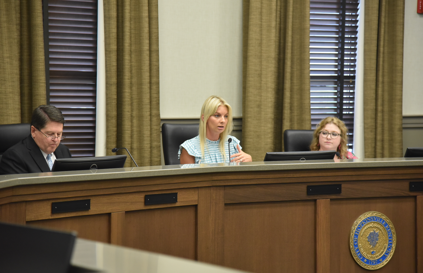 Sarah Whitaker, who chairs the Hopkinsville Small Business Commission, is flanked by City Attorney Doug Willer and City Administrative Coordinator Diane Turner at the commission's first meeting Wednesday, July 19, 2023, in city council chambers. (Hoptown Chronicle photo by Jennifer P. Brown)