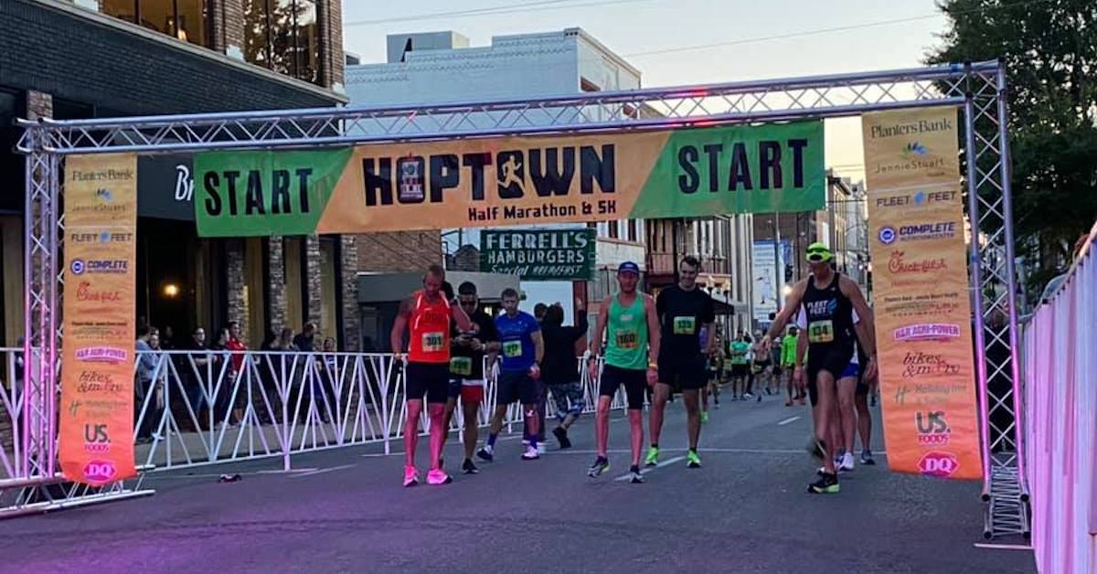 Runners prepare for the start of the 2020 Hoptown Half Marathon on South Main Street. (Photo by Jim Creighton)