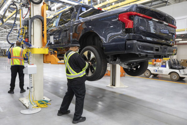 electric vehicle plant workers