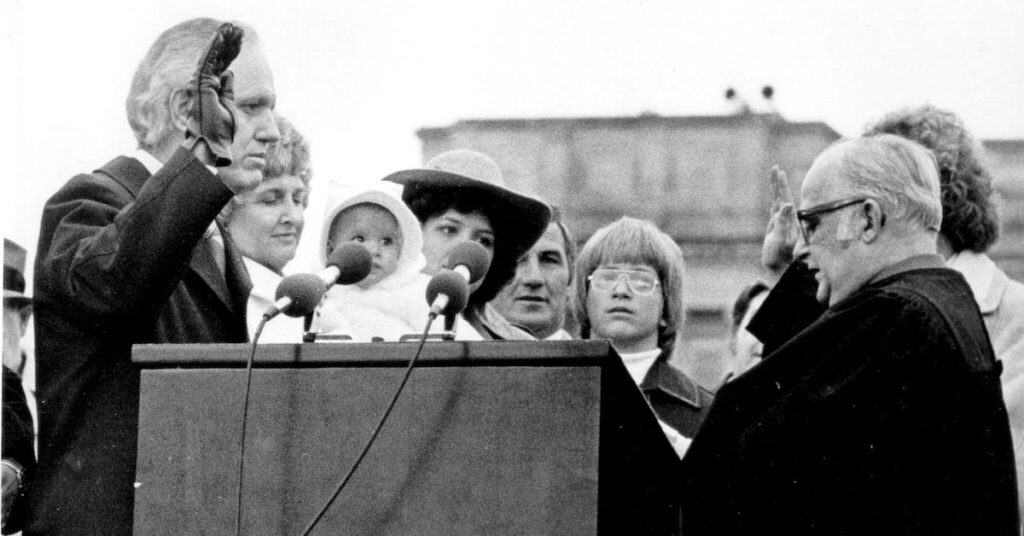 Julian Carroll takes the oath of office in 1975. (University of Kentucky Libraries Special Collections Research Center)