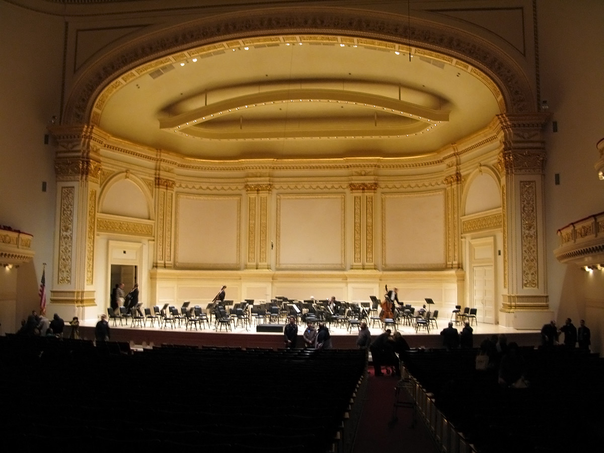 The main hall’s stage inside Carnegie Hall. (Wikimedia Commons)