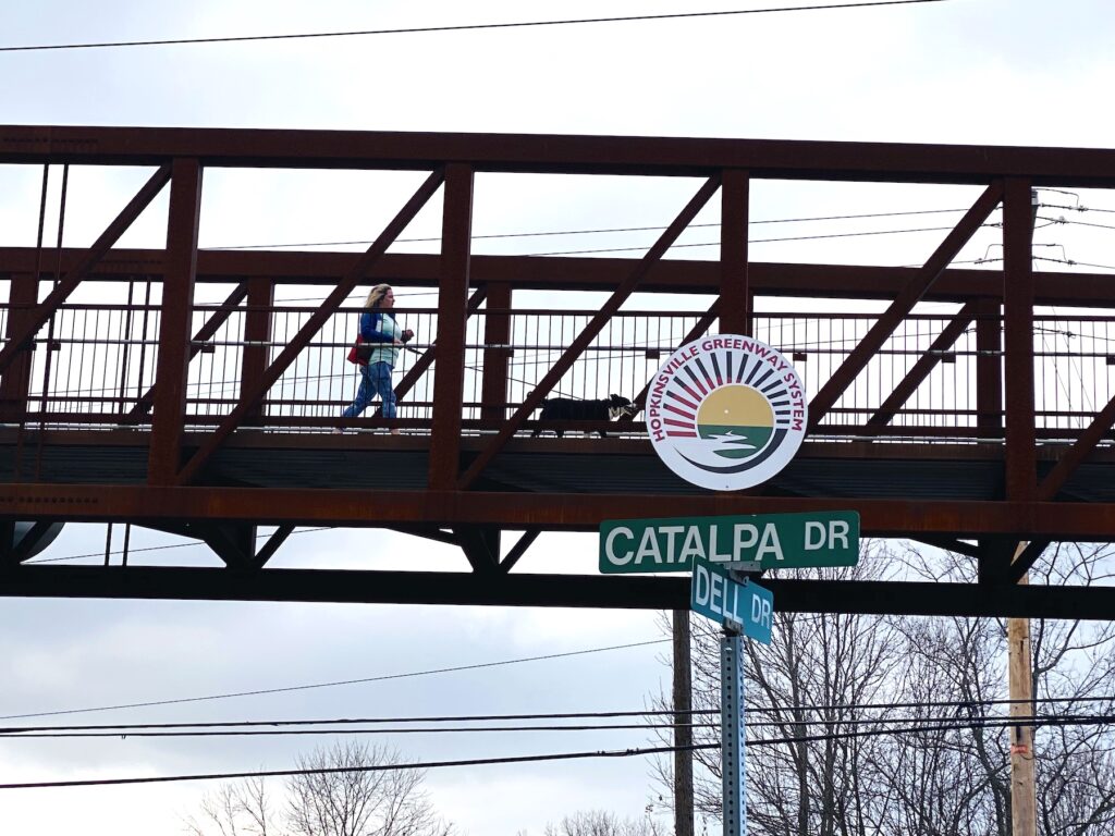 Greenway bridge with Catalpa and Dell street sign