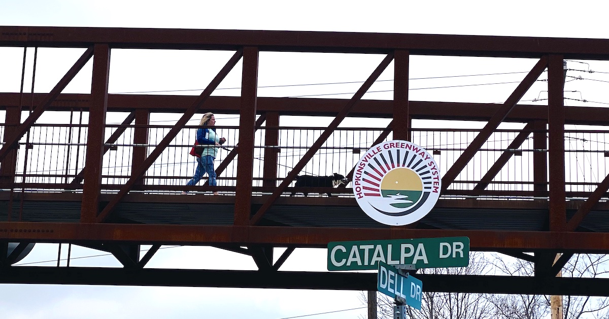 Greenway bridge with Catalpa and Dell street sign