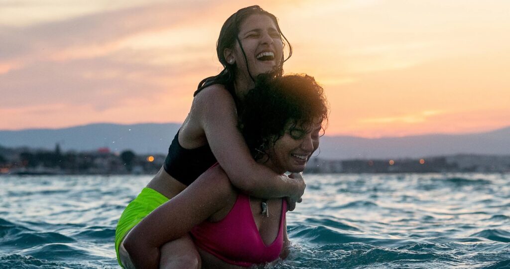 girls swimming in the ocean