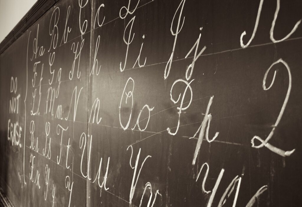 cursive on blackboard