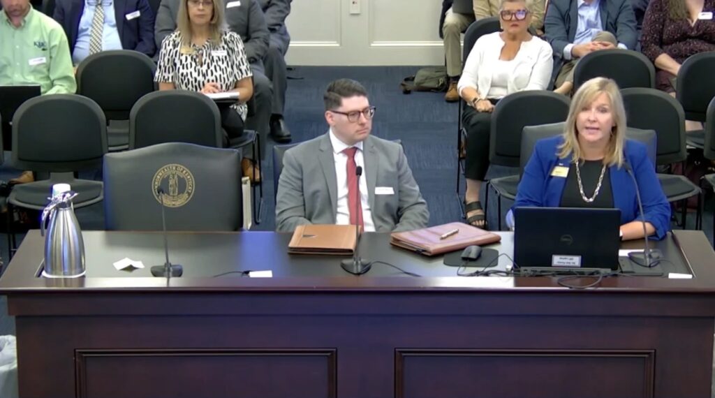 kentucky housing director speaking at desk