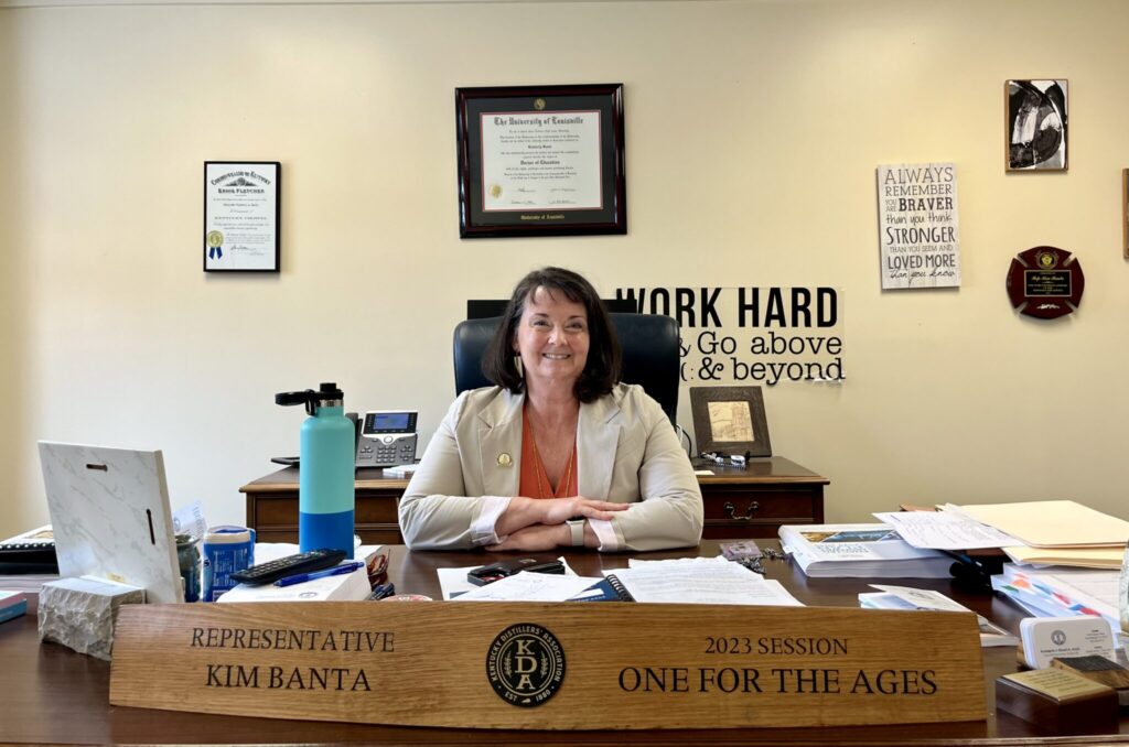 Rep. Kim Banta at desk