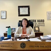 Rep. Kim Banta at desk