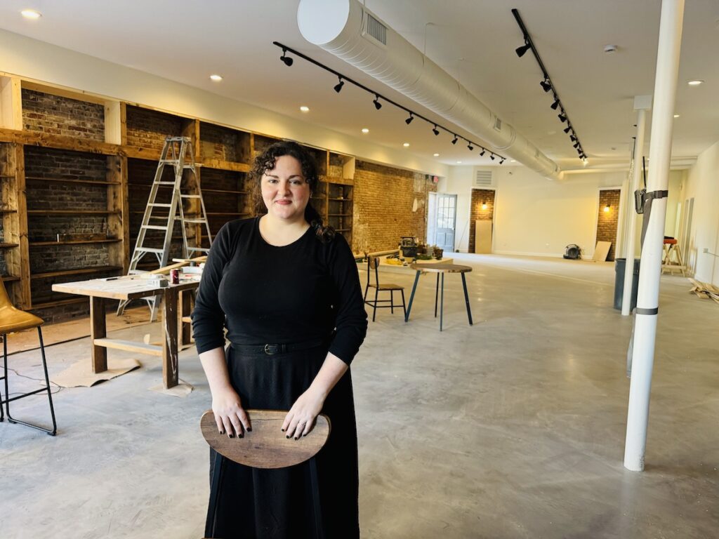 rachel sanders inside book & bottle shop building