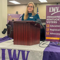 Kentucky League of Women Voters President Jennifer Jackson at podium