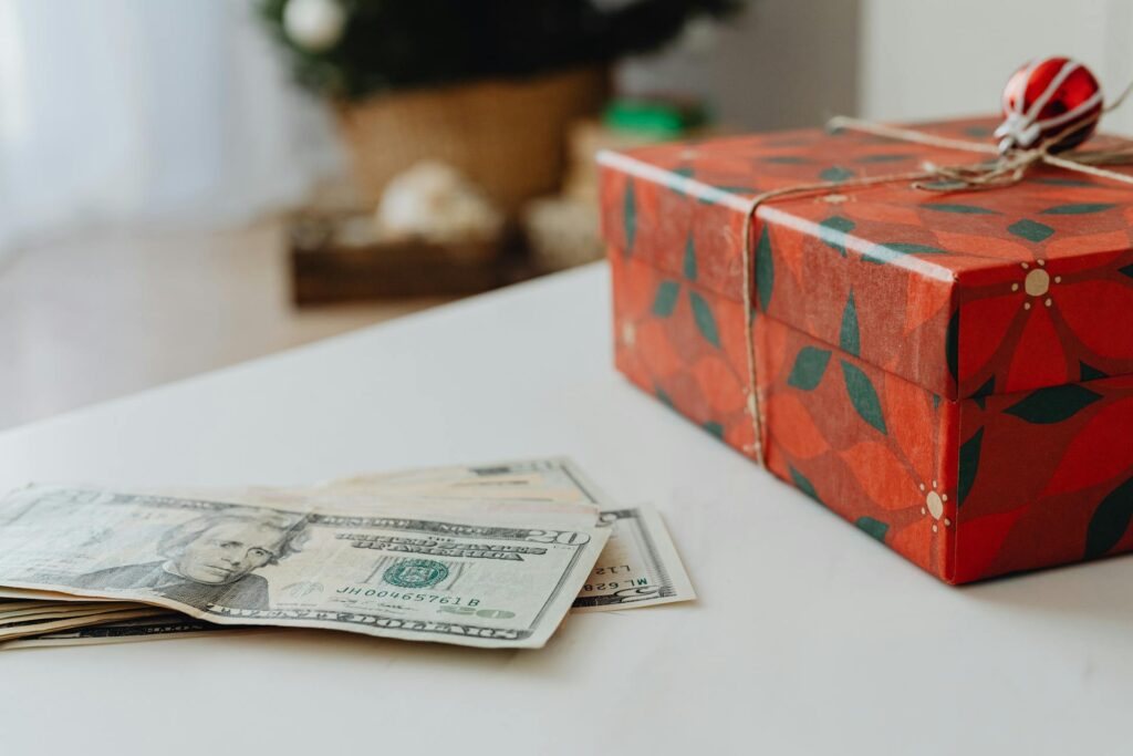 cash next to christmas gift