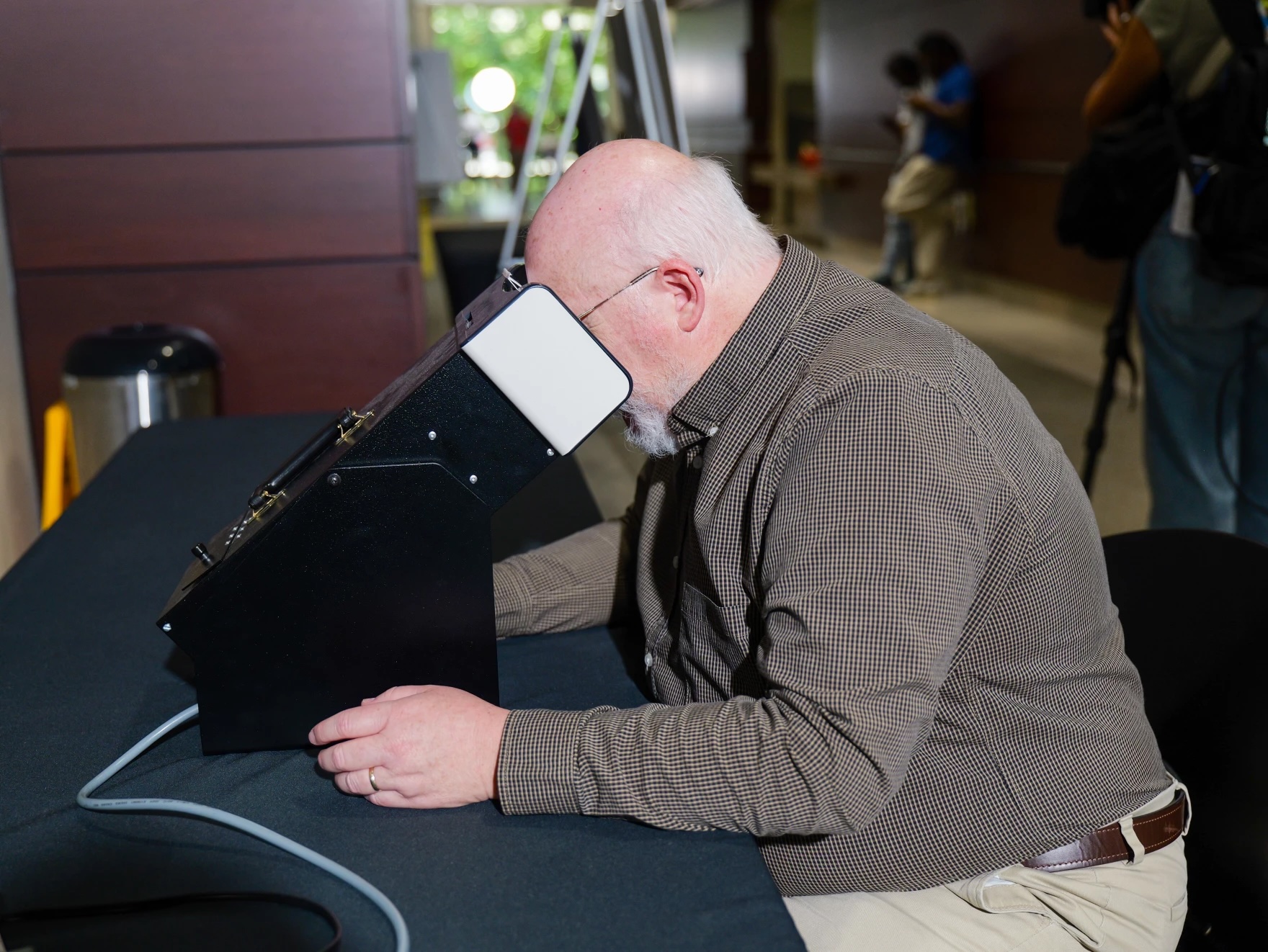 man taking vision test