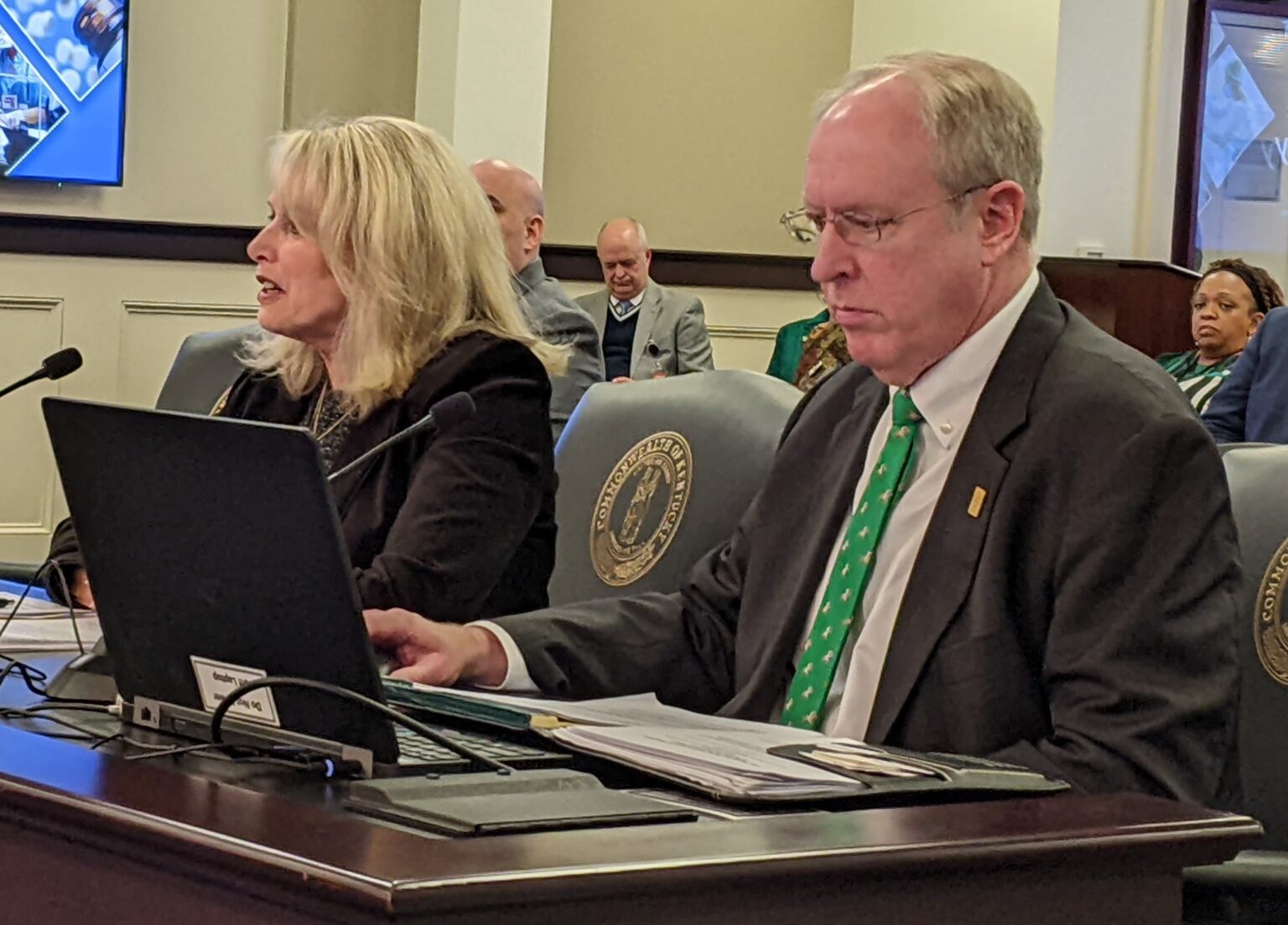 Kentucky Hospital Association President Nancy Galvagni and KHA Vice President of Policy and Government Affairs Jim Musser gave an overview of the success of the Kentucky Hospital Rate Improvement Program at the Jan. 9 House Health Services Committee. (Photo by Melissa Patrick | Kentucky Health News)