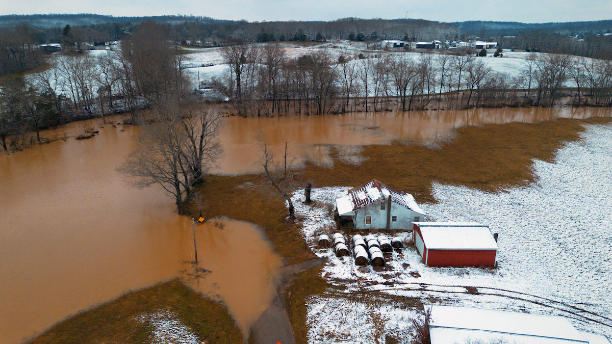 The flooded Bacon Creek in Hart County, Kentucky on Sunday, Feb. 16, 2025. (Austin Anthony for the Kentucky Lantern)