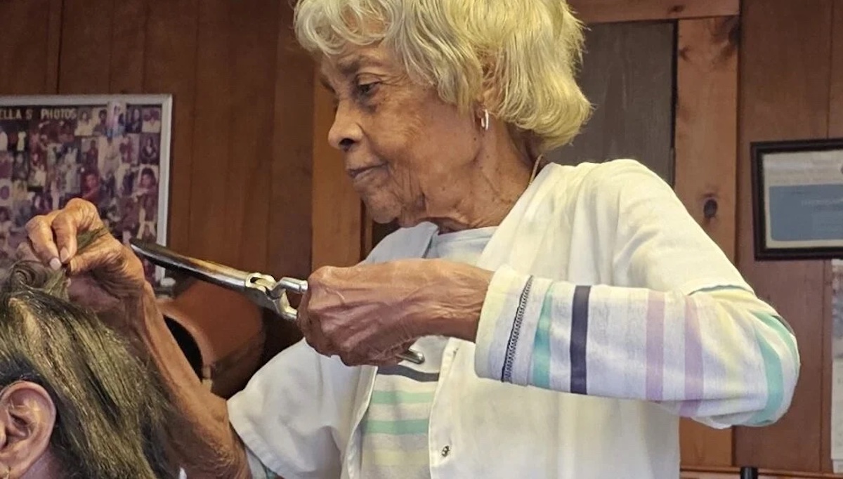 Ella Woolfolk works at her Plum Street salon, Woolfolk Beauty Shop, in February. She’s been doing hair at the same location since 1954. (Hendersonian photo by Vince Tweddell)