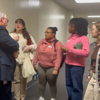 students speaking to legislator