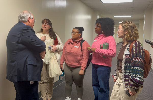 students speaking to legislator