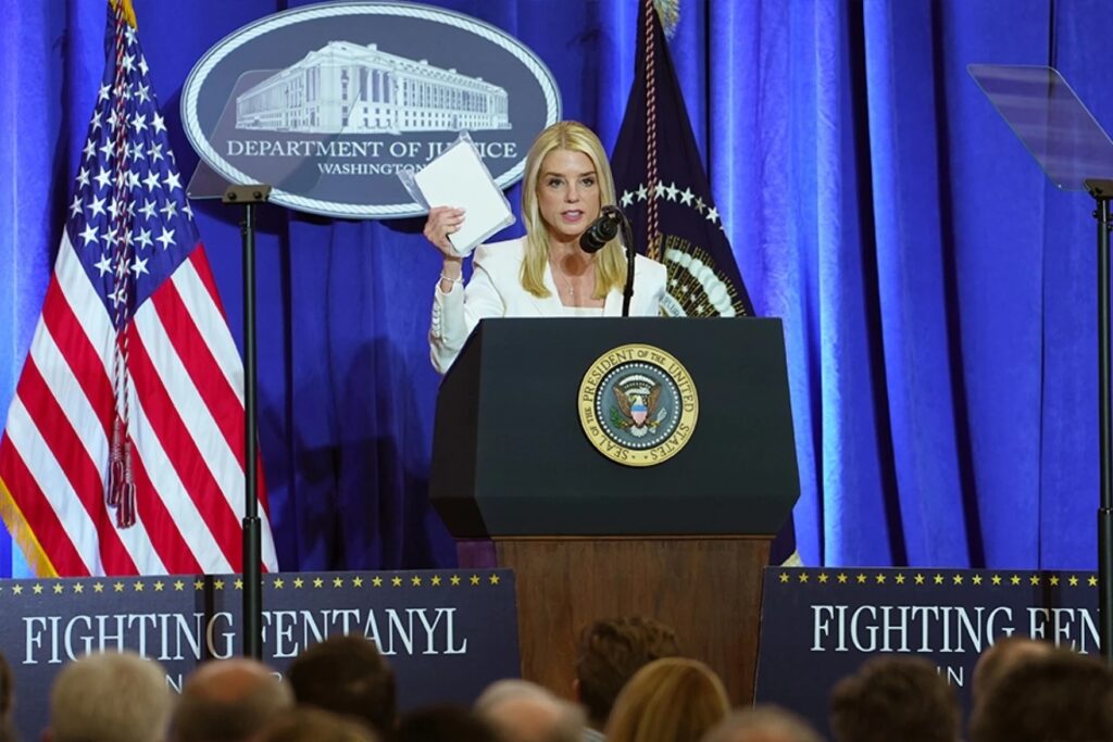woman at doj podium