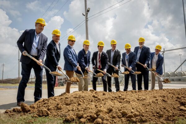 men with shovels of dirt