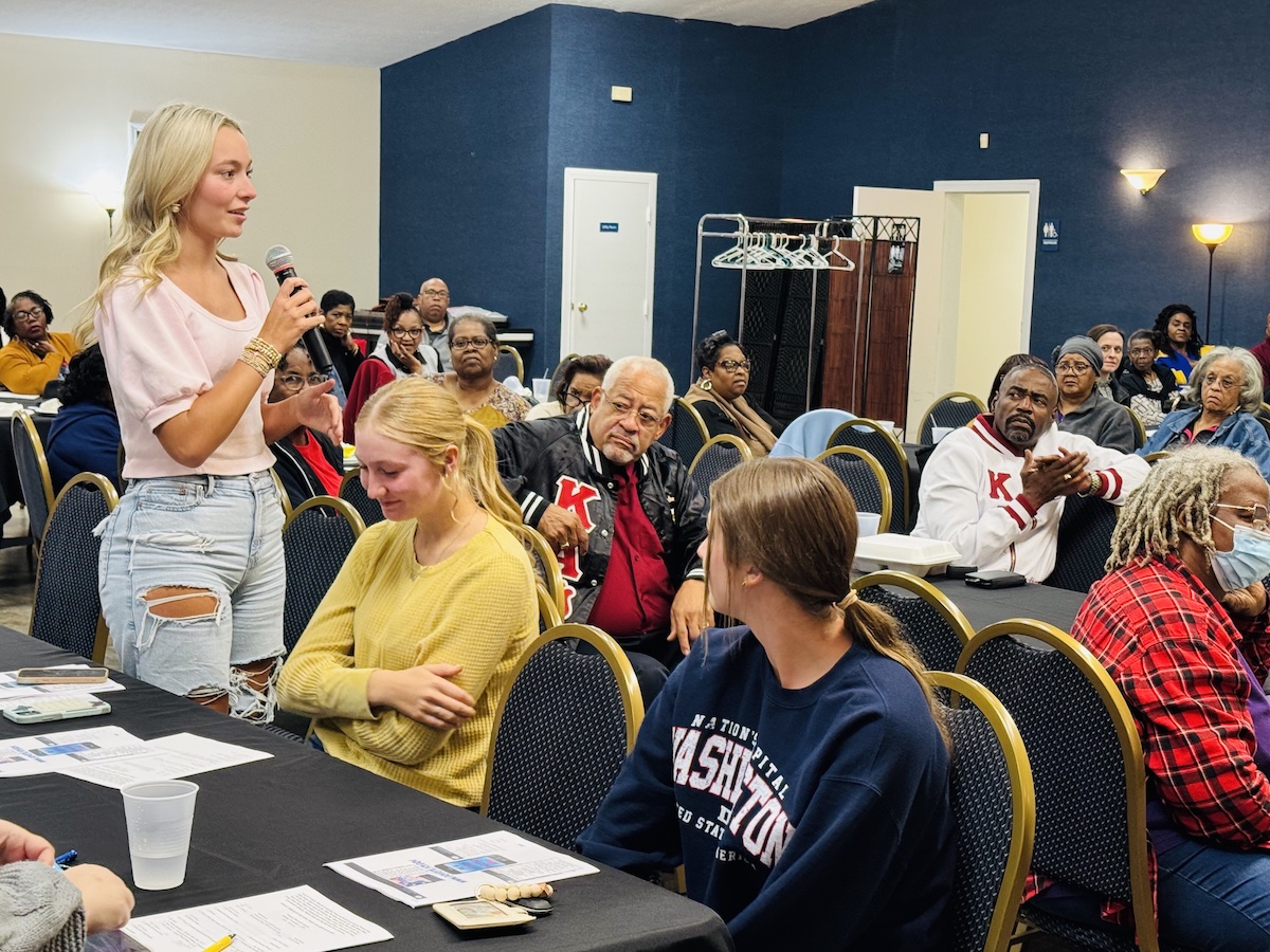 Lillian Burcham, a senior at University Heights Academy, poses a question during the voter forum Monday, Nov. 3, 2025, at the Pioneers Complex. She asked how voters can be informed about their choices in elections. (Hoptown Chronicle photo by Jennifer P. Brown)