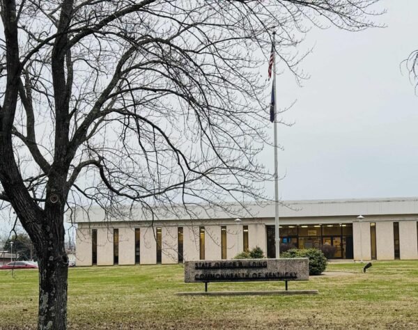 building exterior behind tree and Kentucky Career Center sign