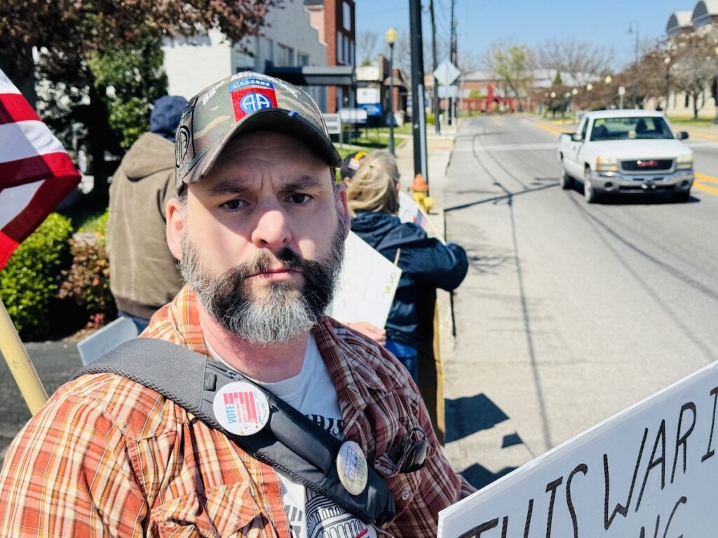 protester with sign