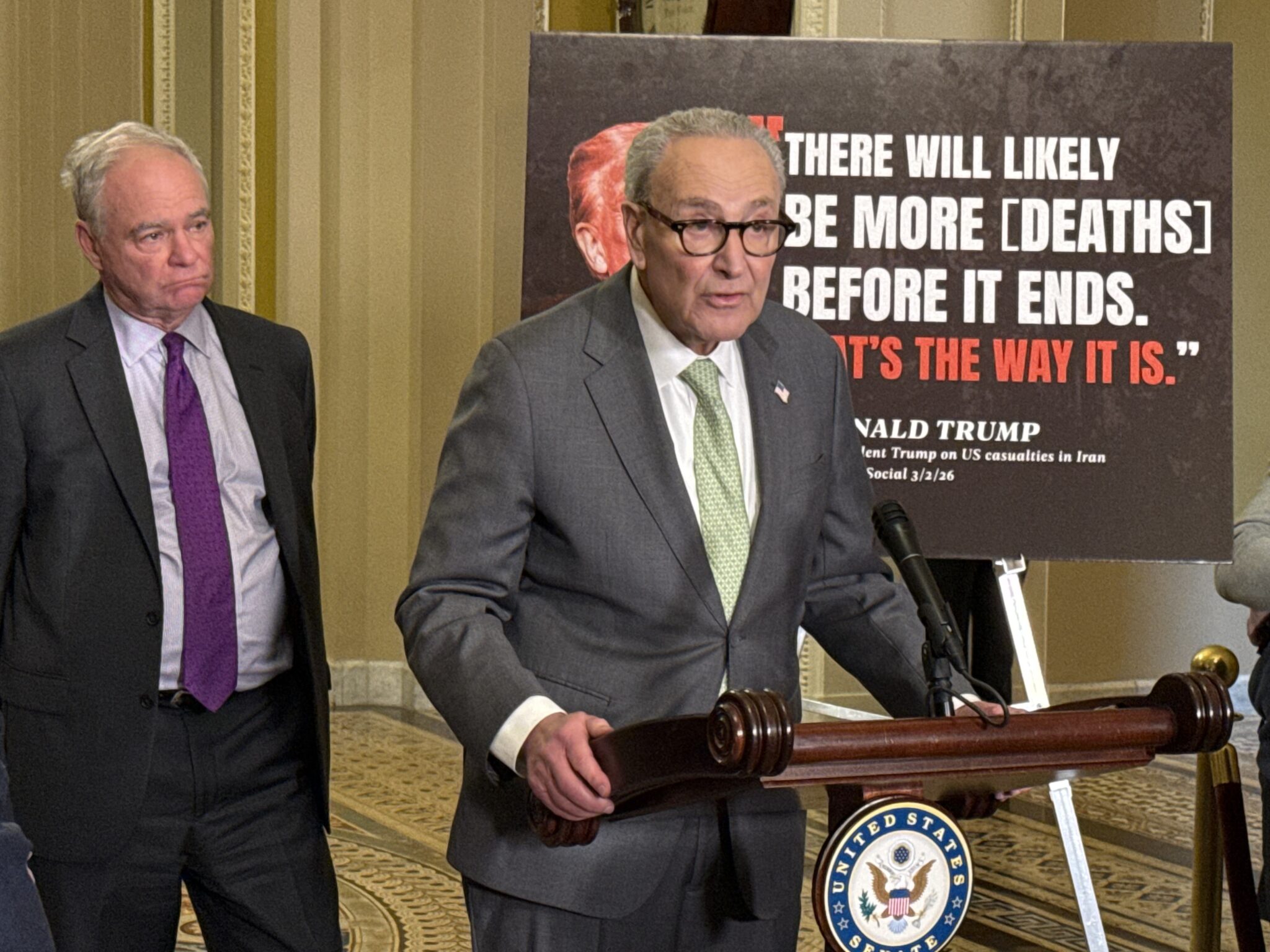 Senate Minority Leader Chuck Schumer, D-N.Y., speaks with reporters during a press conference in the Ohio Clock Corridor of the U.S. Capitol building in Washington, D.C., on Tuesday, March 3, 2026. At left is Virginia Democratic Sen. Tim Kaine. (Photo by Jennifer Shutt | States Newsroom)