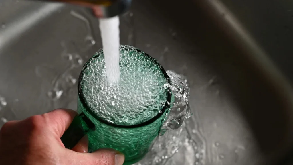faucet water filling glass